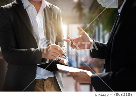 Marketing staff are analyzing the data to business planning at office in the morning. Marketing staff are analyzing the data to business planning at office in the morning. 78633188