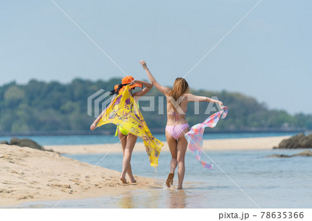Portrait of thai woman posing outdoors at the sea beach 78635366