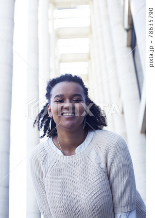 young pretty african girl posing cheerful on city background, lifestyle outdoor people concept young pretty african girl posing cheerful on city background, lifestyle outdoor people concept 78635790