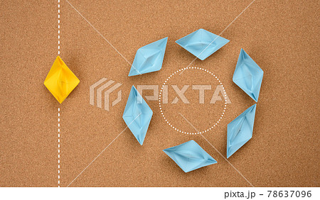 a group of blue boats floats in a circle and one floats along a straight path. The concept of thinking outside the box a group of blue boats floats in a circle and one floats along a straight path. The concept of thinking outside the box 78637096