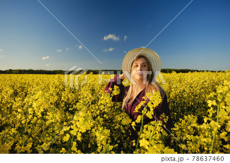 woman in a blooming field woman in a blooming field 78637460