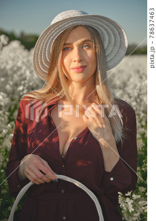 woman in a blooming field woman in a blooming field 78637463