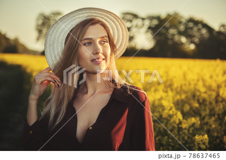woman in a blooming field woman in a blooming field 78637465