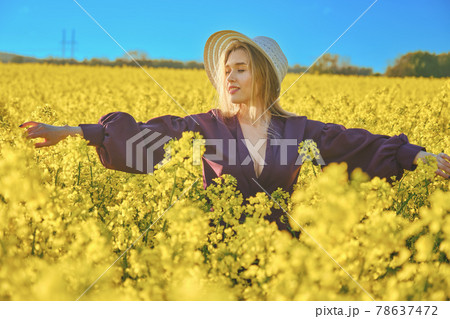woman in a blooming field woman in a blooming field 78637472