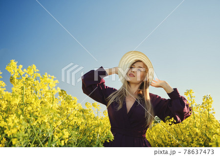 woman in a blooming field 78637473