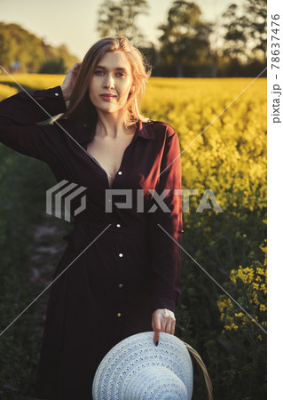 woman in a blooming field 78637476