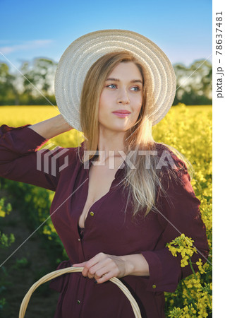 woman in a blooming field 78637481