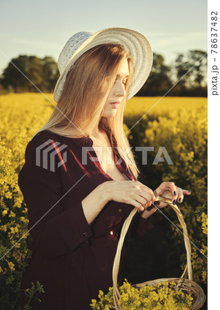 woman in a blooming field 78637482