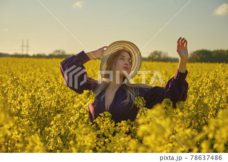 woman in a blooming field 78637486