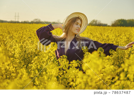 woman in a blooming field woman in a blooming field 78637487