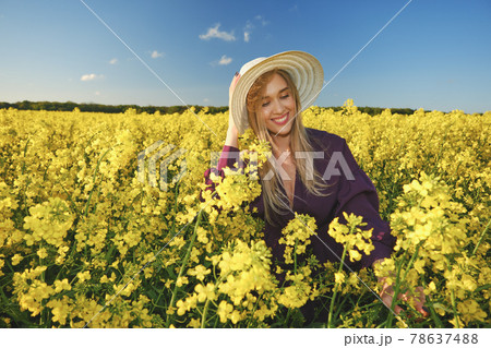 woman in a blooming field woman in a blooming field 78637488