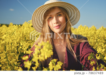 woman in a blooming field 78637489
