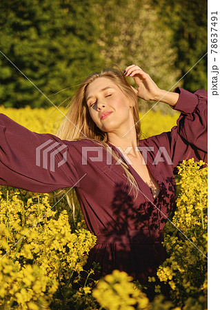 woman in a blooming field 78637491