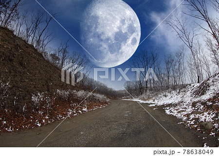 Winter forest road and big fantastic Moon 78638049