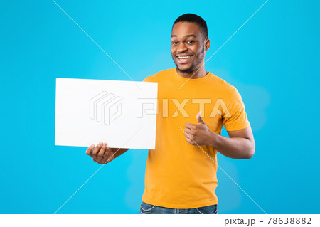 Black Guy Showing Blank White Board Gesturing Thumbs-Up, Blue Background 78638882