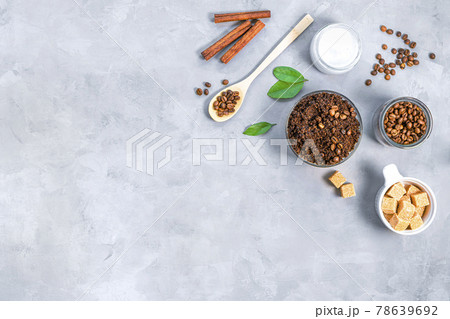 Homemade body scrub of ground coffee, sugar and coconut oil Homemade body scrub of ground coffee, sugar and coconut oil 78639692
