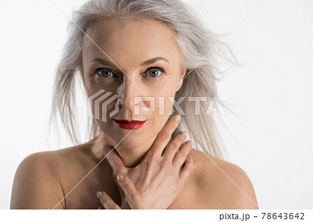 Dreamy senior lady with perfect skin portrait Dreamy senior lady with perfect skin portrait 78643642