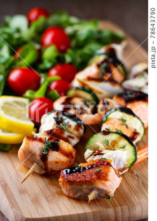 Fish skewers with mixed salad. High quality photo. Fish skewers with mixed salad. High quality photo. 78643790