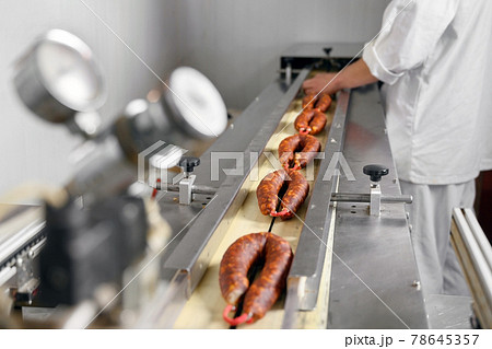 Sausages. Packing line of sausages. Industrial manufacture of sausage products. 78645357