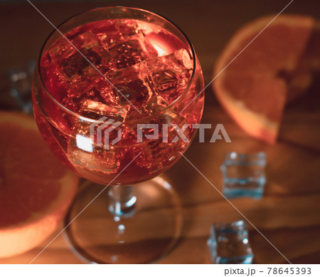 Italian spritz close up on wooden table Italian spritz close up on wooden table 78645393