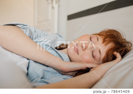 Lady resting and sleeping in her bedroom at the morning Lady resting and sleeping in her bedroom at the morning 78645409