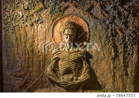 Figure of starving human at Hanibe caves, Japan. 78647557