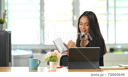 Business female working online while video calling on freelance meeting. Business female working online while video calling on freelance meeting. 78660646