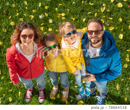 Happy family outdoor in autumn Happy family outdoor in autumn 78664538