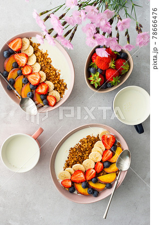 Homemade granola with yogurt and sweet fruit 78666476