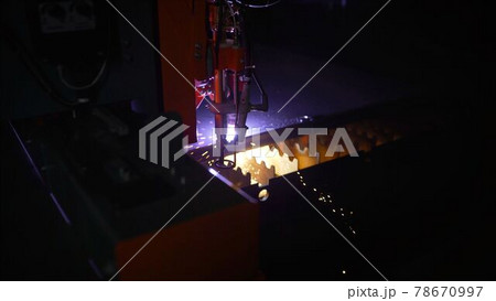Industrial cnc plasma cutting of metal plate.Laser cutting of metal at an industrial plant. 78670997
