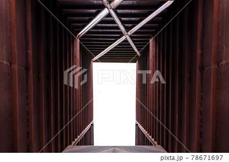 Entrance of industrial rusty warehouse building 78671697