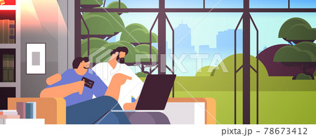 young couple with credit card using laptop online shopping concept man woman ordering goods together young couple with credit card using laptop online shopping concept man woman ordering goods together 78673412