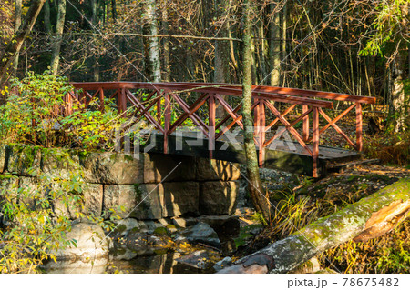 Wooden bridge on Emperor Alexander lll fishing lodge Langinkoski, Kotka, Finland. 78675482