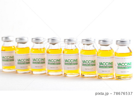 Looped. Flasks of vaccine for COVID-19 coronavirus in research lab. Vaccination, injection, clinical trial during pandemic, macro Looped. Flasks of vaccine for COVID-19 coronavirus in research lab. Vaccination, injection, clinical trial during pandemic, macro 78676537