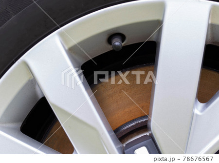 Rusty, defective brake disc with a shoulder on the edge. Worn brake disc concept, brake failure, macro Rusty, defective brake disc with a shoulder on the edge. Worn brake disc concept, brake failure, macro 78676567