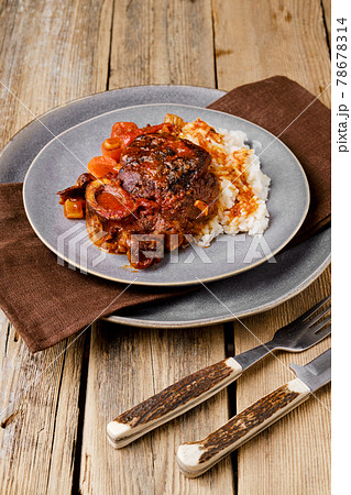 Overhead view of plate with ossobuco Overhead view of plate with ossobuco 78678314