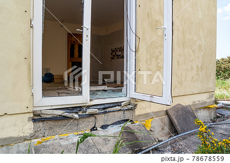 Broken glass after break in at glas door. Broken glass after break in at glas door. 78678559