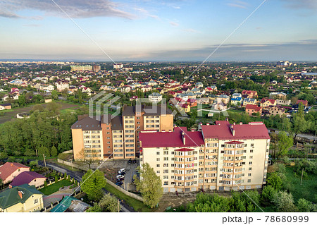 Aerial view of multistory apartment buildings in green residential area. Aerial view of multistory apartment buildings in green residential area. 78680999