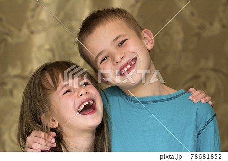 Two little children brother and sister together. Girl hugging boy. Family relations concept. 78681852