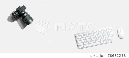 Computer keyboard with a SLR camera Computer keyboard with a SLR camera 78682238