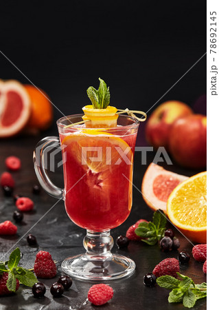 Fruit and berry tea with raspberry, currant, orange, grapefruit Fruit and berry tea with raspberry, currant, orange, grapefruit 78692145