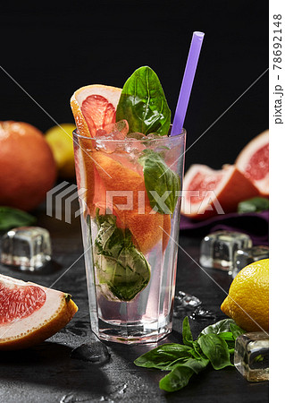 Refreshing nonalcoholic drink with pink grapefruit and basil Refreshing nonalcoholic drink with pink grapefruit and basil 78692148