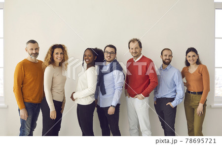 Diverse casual people team different age and nationality posing for camera Diverse casual people team different age and nationality posing for camera 78695721