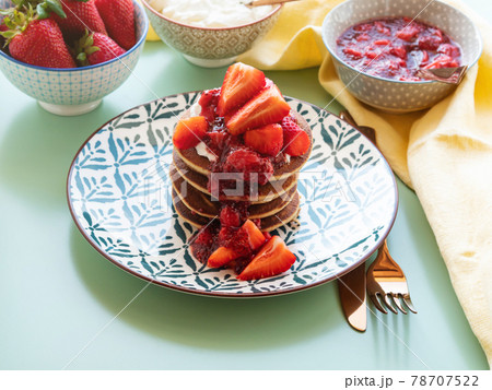 Vegan gluten free banana buckwheat pancakes served with dairy free yogurt and chia strawberry jam Vegan gluten free banana buckwheat pancakes served with dairy free yogurt and chia strawberry jam 78707522