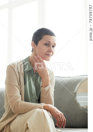 Candid Portrait of Mature Woman at Home 78708787