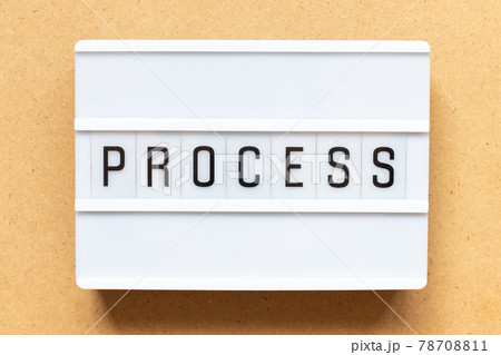 Lightbox with word process on wood background 78708811