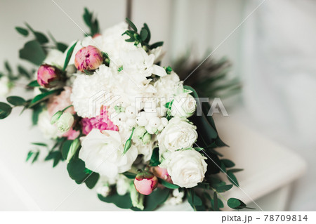 Beautiful wedding bouquet with different flowers, roses Beautiful wedding bouquet with different flowers, roses 78709814