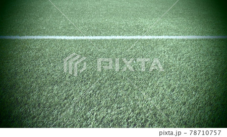 soccer field for championship.The marking of the football field on the green grass. White line. Football field area. Dark vignetting around the edges soccer field for championship.The marking of the football field on the green grass. White line. Football field area. Dark vignetting around the edges 78710757