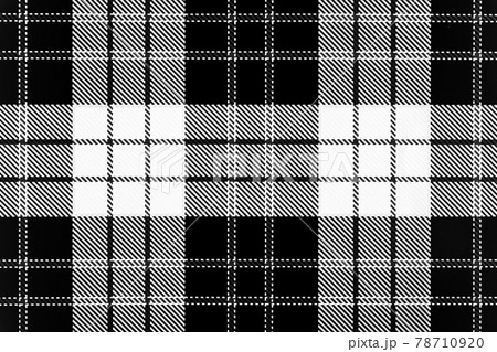 Spotted black and white grunge. Abstract halftone background. Trendy weave texture. Monochrome particles abstract for wallpaper. Interior fabric garment gift wrapping paper graphic design. 78710920