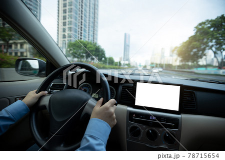 Driving car on city street 78715654